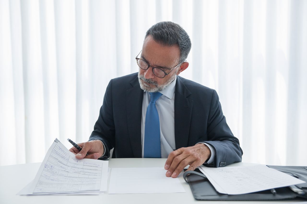 Man rebalancing an investment portfolio